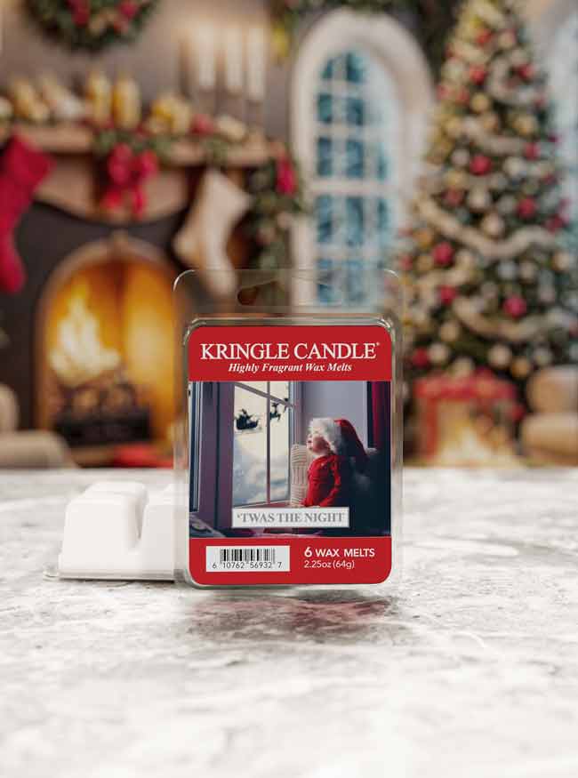 Kringle Candle wax melt package with Christmas decorations in the background